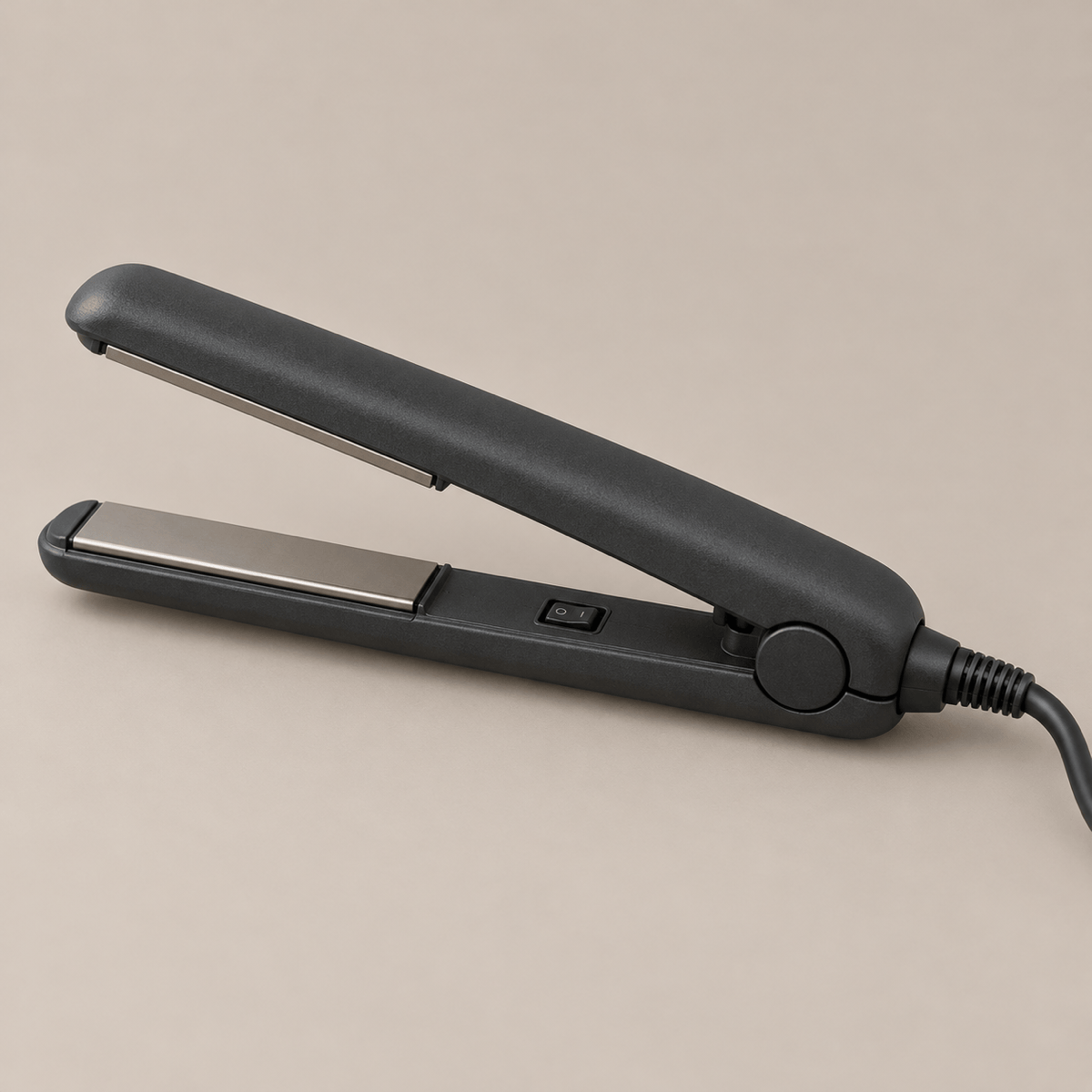 Unbranded dry straightening iron for comparison on a warm cream background.