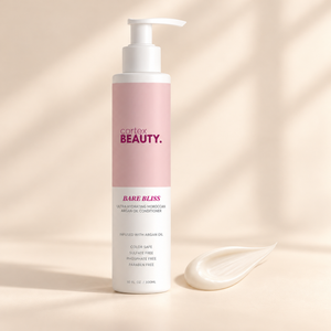 Bare Bliss | Hydrating Moroccan Argan Oil Conditioner | 10 oz with a formula texture swatch on a cream surface